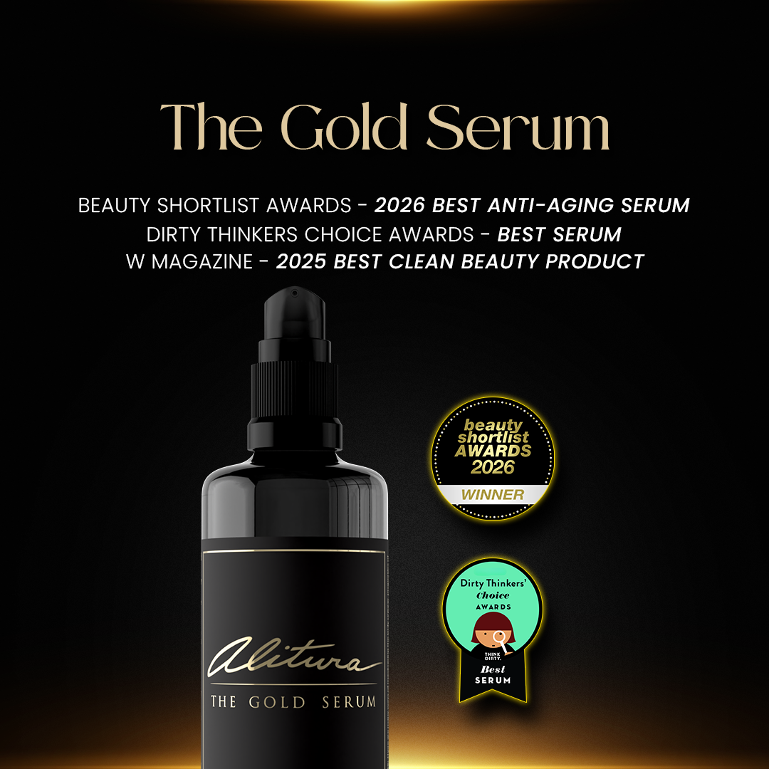 Black serum bottle with awards on a dark background