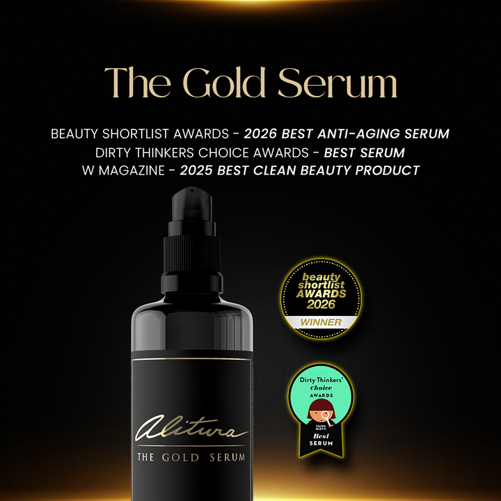 Black serum bottle with awards on a dark background