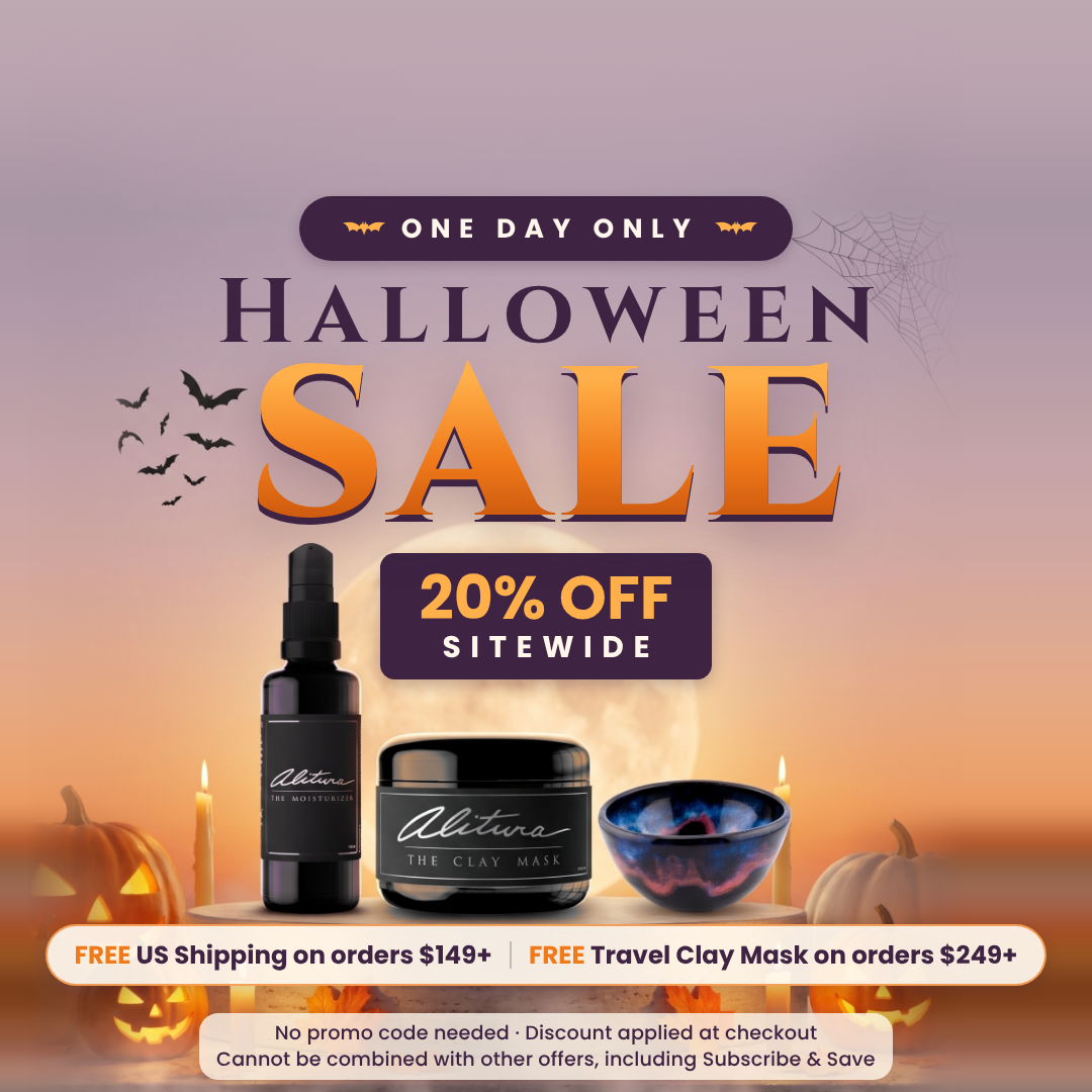 Halloween sale promotional banner featuring a bottle of alitura moisturizer, a jar of clay mask , and a bowl of clay mask powder on a stone pedestal, with candles, a full moon, and spooky background elements.