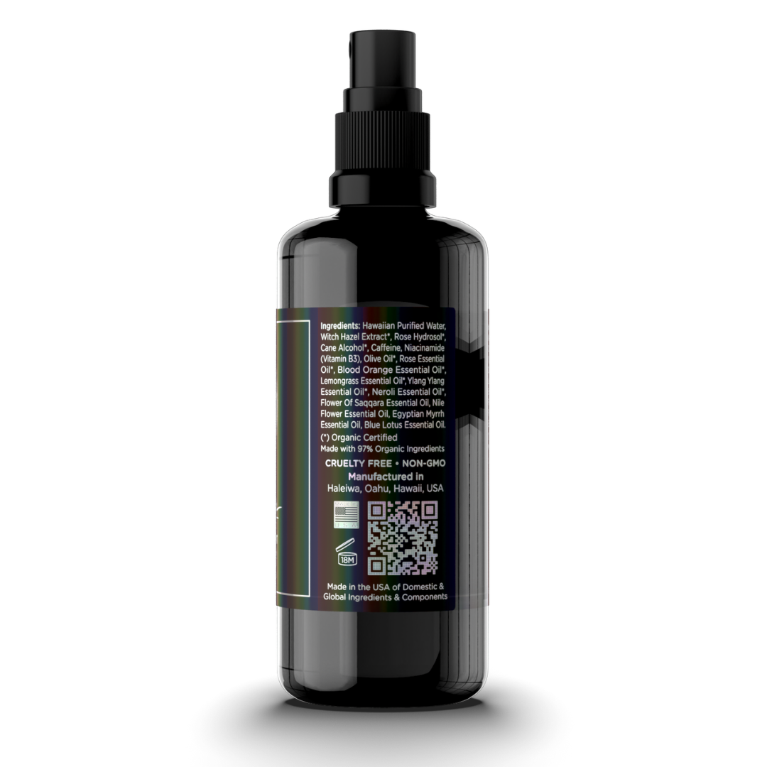 Black spray bottle with label on a white background