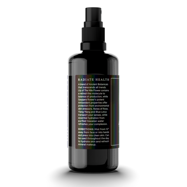 Black spray bottle with label on white background