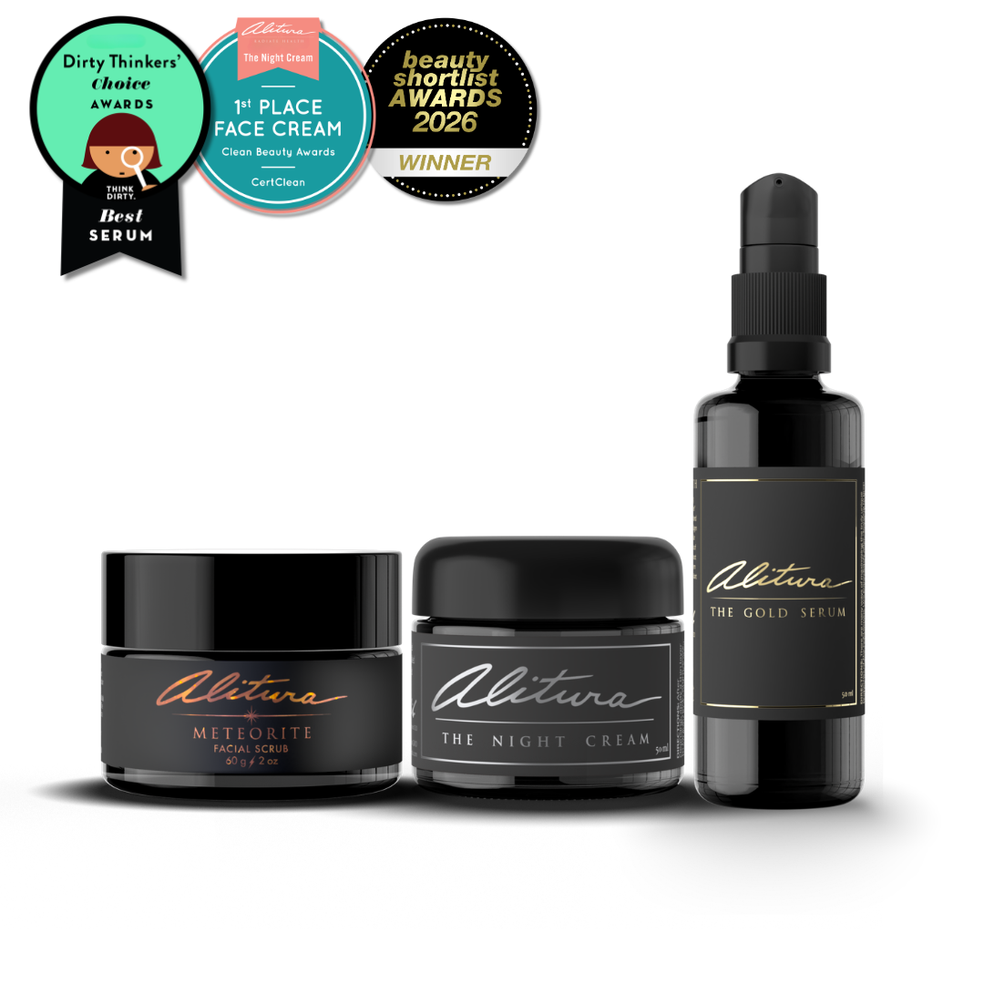 Alitura skincare products including a serum, night cream, and facial scrub with awards on a white background.