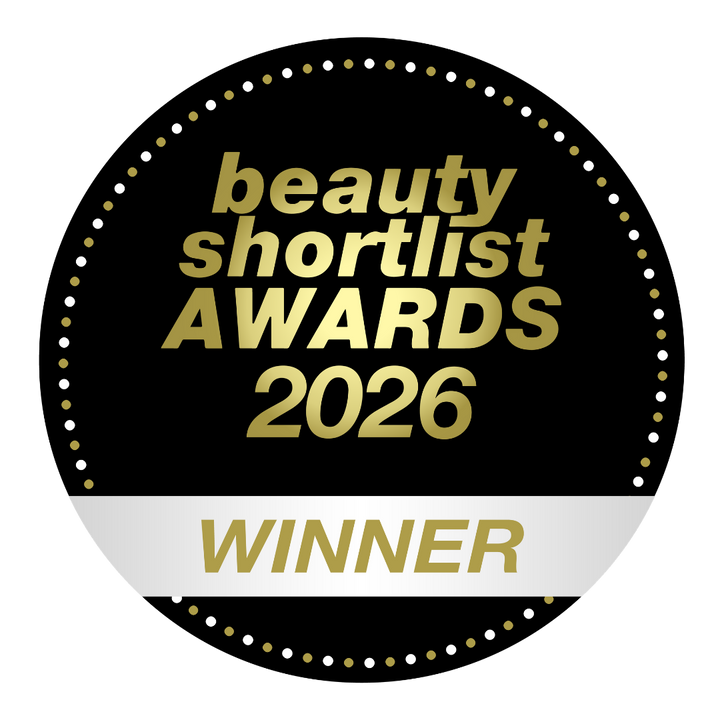 Circular badge with 'beauty shortlist AWARDS 2026 WINNER' text on a black background