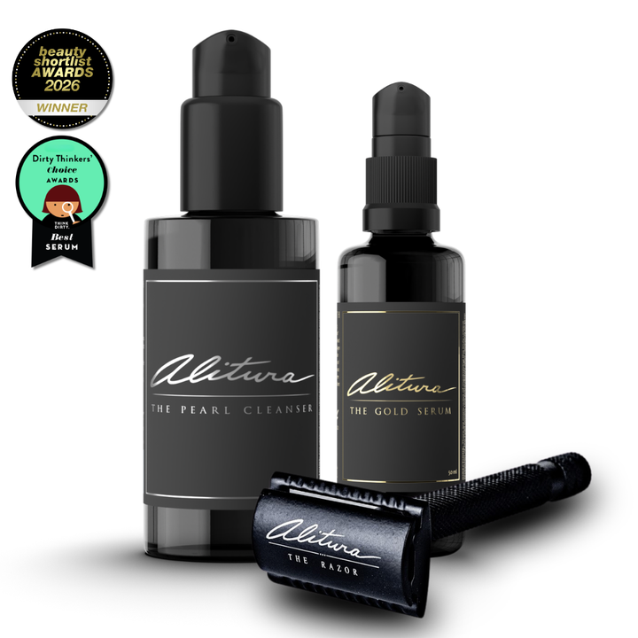 Two black bottles labeled 'The Pearl Cleanser' and 'The Gold Serum' with a black razor on a white background, featuring awards badges.