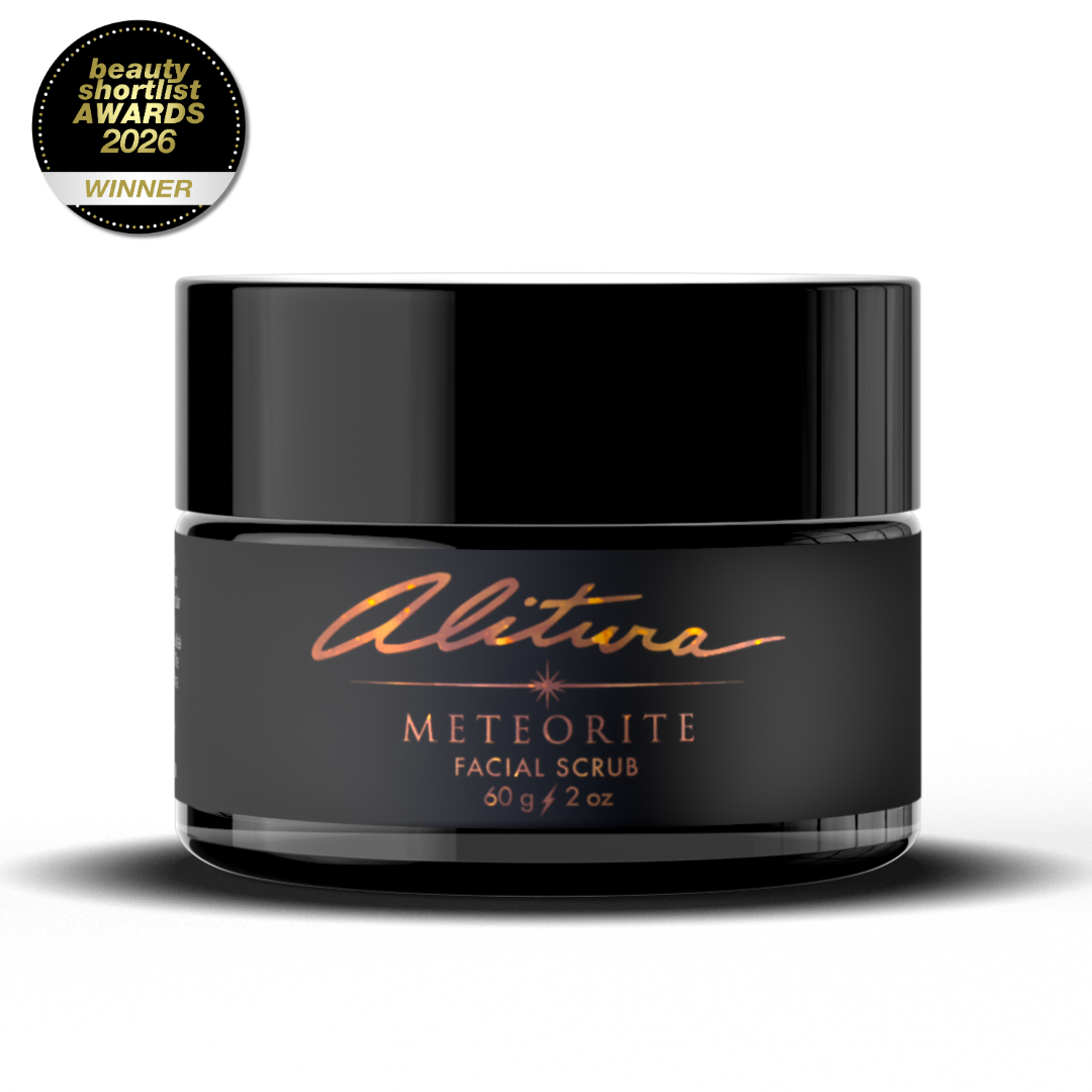 Black jar of Alitura Meteorite Facial Scrub with a gold logo on a white background