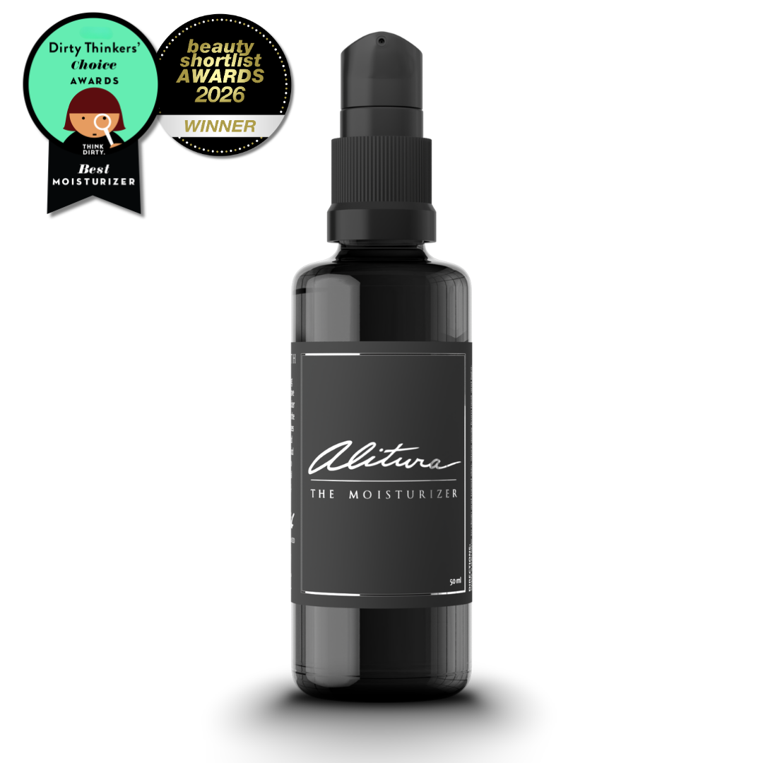 Black bottle of 'Alitura' moisturizer with awards on a white background
