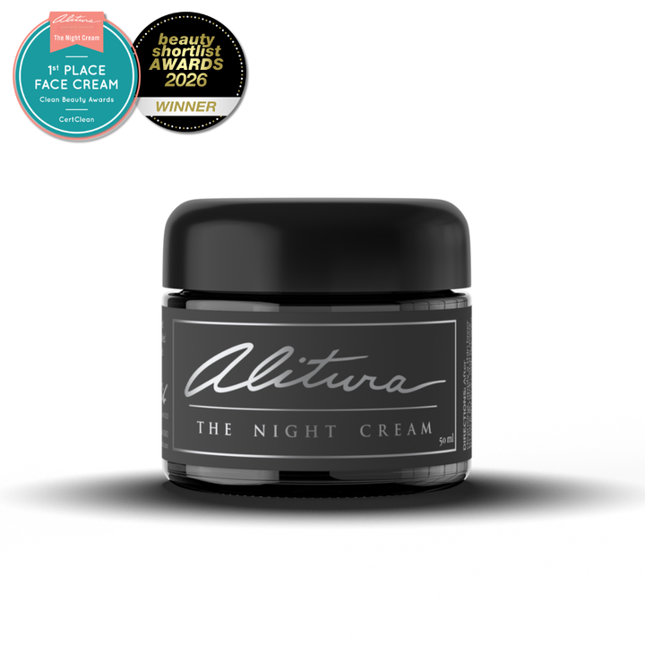 Black jar of 'The Night Cream' by Alitura with awards on a white background