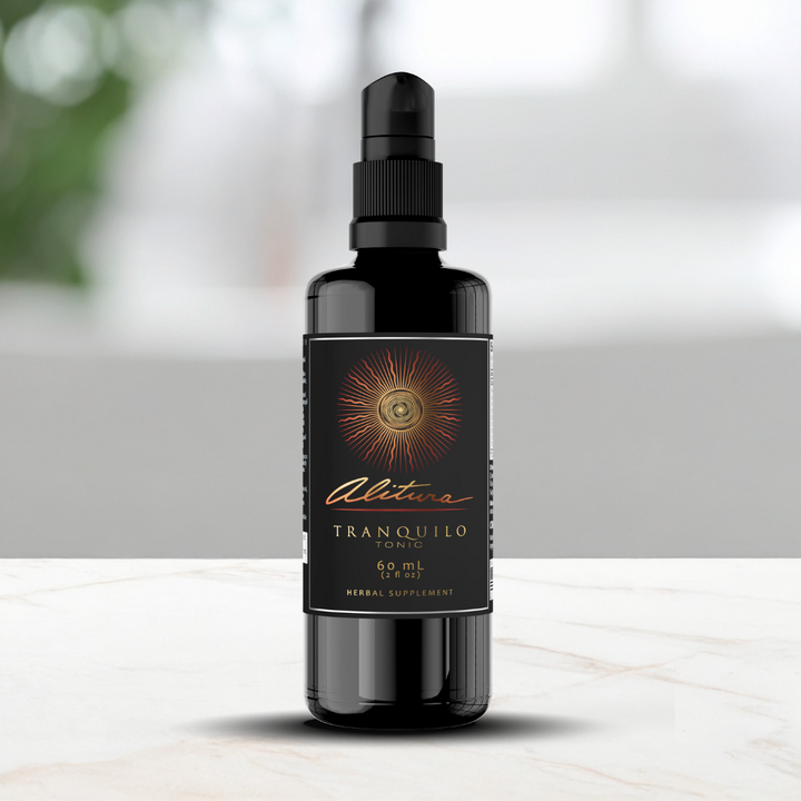 Black Alitura Tranquilo bottle with a label on a white surface with a blurred green background