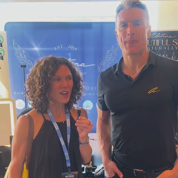 Video of a woman and Andy, with the woman sharing her positive testimonial about the gold serum at beyond biohacking conference 2026